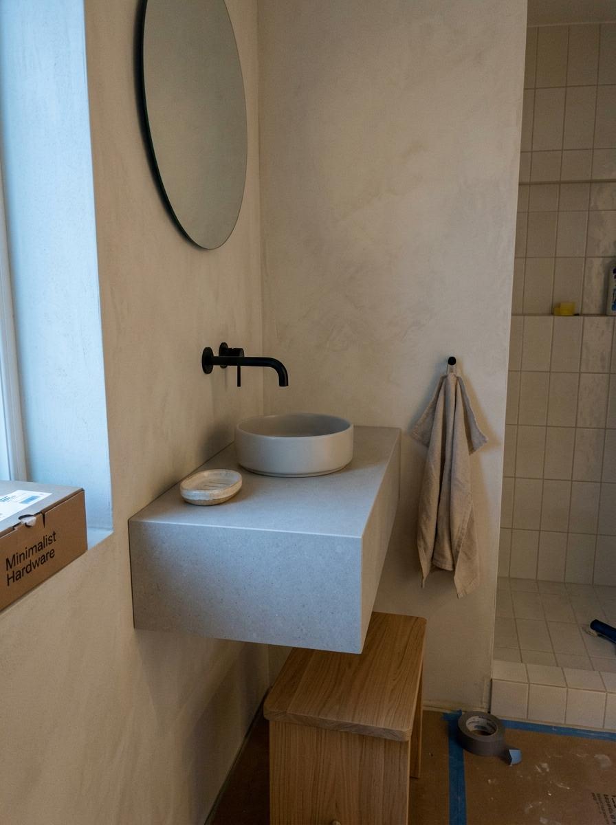 Minimalist Fixtures Define This Japandi Bathroom Remodel Style